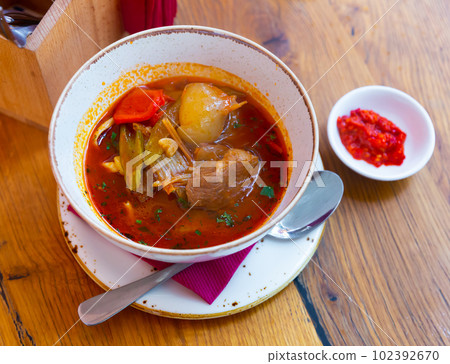 Uigur soup lagman with meat and vegetables 102392670