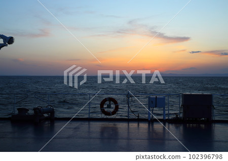 sunset seen from the boat 102396798