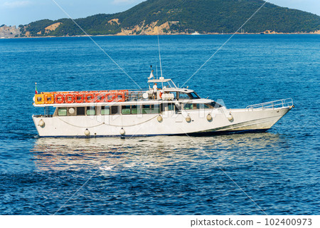 White Empty Tourist Ferry in the Gulf of La Spezia Liguria Italy 102400973
