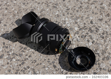 A standard zoom lens that was dropped on the road and broke A standard zoom lens that was dropped on the road and broke 102403106