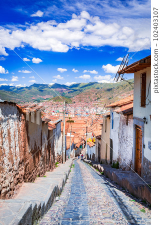 Cusco, Peru. Historic street, colonial architecture, bustling culture in South America. Cusco, Peru. Historic street, colonial architecture, bustling culture in South America. 102403107