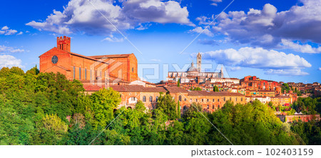 Siena, Italy - Panoramic view with Dome sunset with blue sky, Tuscany travel background. 102403159