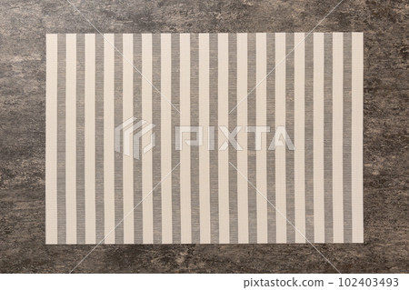 Top view of light tablecloth for food on cement background. Empty space for your design Top view of light tablecloth for food on cement background. Empty space for your design 102403493