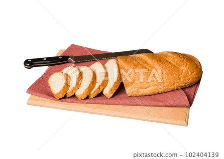 Assortment of freshly sliced baked bread with napkin isolated on white background. Healthy unleavened bread. French bread slice Assortment of freshly sliced baked bread with napkin isolated on white background. Healthy unleavened bread. French bread slice 102404139