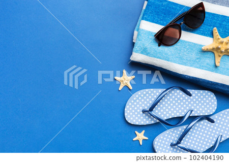 Summer vacation concept flat lay. beach accessories and towel top view. Space for text. travel concept 102404190