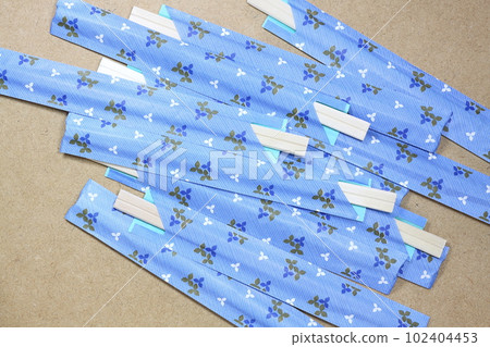 Lots of disposable chopsticks Lots of disposable chopsticks 102404453