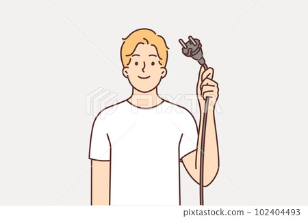 Man shows wire with plug from electrical equipment, offering to turn off appliances for save energy 102404493