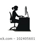 A simple silhouette of a female desk worker sitting and doing paperwork using a computer 102405601
