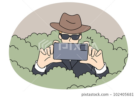 Private detective with camera spying in bushes Private detective with camera spying in bushes 102405681