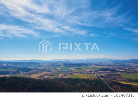 Natural landscape with mountain ranges and valleys Natural landscape with mountain ranges and valleys 102407313