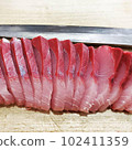 Yellowtail sashimi cut with Yanagiba knife 102411359
