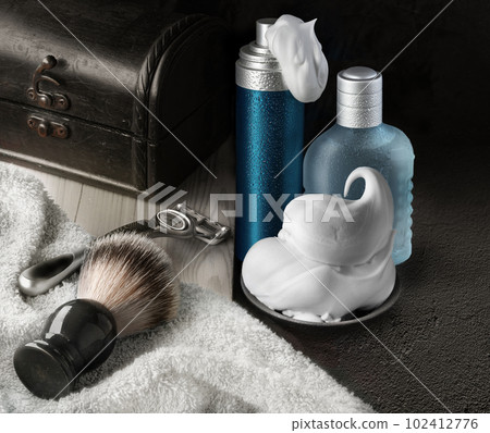 Shaving accessories set on dark background mockup Shaving accessories set on dark background mockup 102412776