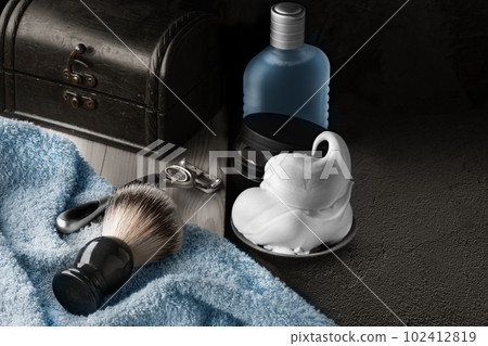 Shaving accessories set on a black background mockup Shaving accessories set on a black background mockup 102412819
