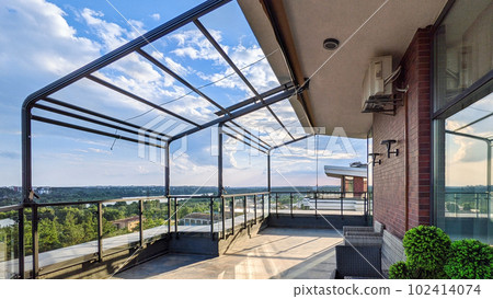 Awnings assembled on the terrace. Penthouse on the top floor with a terrace, awning on it and a gorgeous view of the forest. 102414074