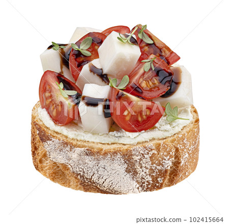 Baguette slice with cream cheese and tomato with balsamic sauce isolated on white background 102415664