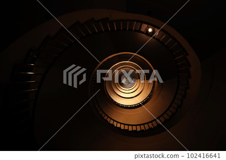 Spiral staircase in a tall multi-floor house, in the form of a "golden ratio", architecture, concept 102416641