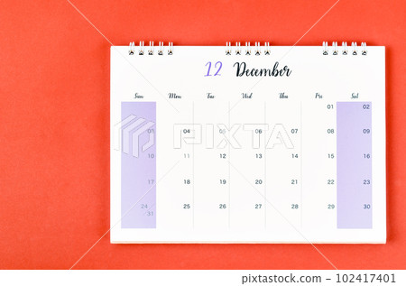 The December 2023 calendar desk for the organizer to plan and reminder on red background. 102417401