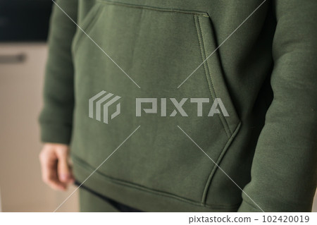 Hoodie texture. Close-up shot of sweatshirt hoodie textile warm fabric macro background Hoodie texture. Close-up shot of sweatshirt hoodie textile warm fabric macro background 102420019
