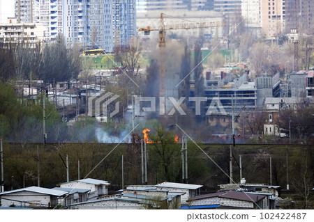 Kiev, Ukraine April 1, 2020: grass burns near the railway in the center of Kiev 102422487