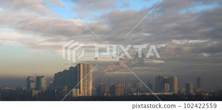 Kiev, Ukraine January 8, 2020: Strong black smog over the buildings and quarters of Kiev Kiev, Ukraine January 8, 2020: Strong black smog over the buildings and quarters of Kiev 102422559