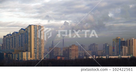 Kiev, Ukraine January 8, 2020: Strong black smog over the buildings and quarters of Kiev Kiev, Ukraine January 8, 2020: Strong black smog over the buildings and quarters of Kiev 102422561
