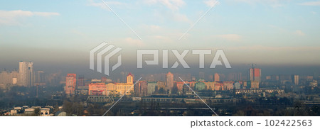 Kiev, Ukraine January 8, 2020: Strong black smog over the buildings and quarters of Kiev Kiev, Ukraine January 8, 2020: Strong black smog over the buildings and quarters of Kiev 102422563