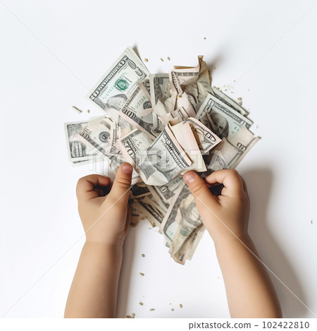 Torn dollar bills in children's hands, the child tore the money, an unpleasant incident close-up on a white Torn dollar bills in children's hands, the child tore the money, an unpleasant incident close-up on a white 102422810