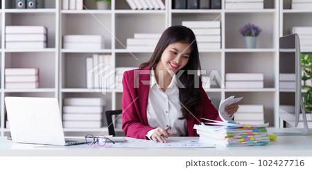 Accountant asian woman working on laptop and do document, tax, exchange, accounting and Financial advisor concept 102427716