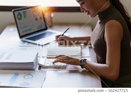 Accountant asian woman working on laptop and do document, tax, exchange, accounting and Financial advisor concept Accountant asian woman working on laptop and do document, tax, exchange, accounting and Financial advisor concept 102427725