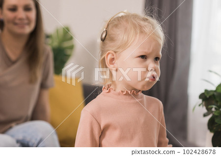 Deaf kid with hearing aid cochlear implant have fun with parents - Hear aid and medicine innovating technology and diversity concept 102428678