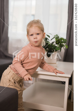 Deaf kid with hearing aid cochlear implant - Hear aid and medicine innovating technology and diversity concept 102428680