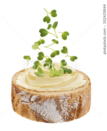 French baguette slice with butter isolated on white background 102429844