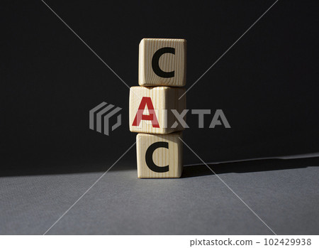 CAC - Customer Acquisition Cost symbol. Wooden cubes with word CAC. Beautiful grey background. Business and Customer Acquisition Cost concept. Copy space. CAC - Customer Acquisition Cost symbol. Wooden cubes with word CAC. Beautiful grey background. Business and Customer Acquisition Cost concept. Copy space. 102429938