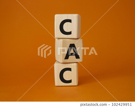 CAC - Customer Acquisition Cost symbol. Wooden cubes with word CAC. Beautiful orange background. Business and Customer Acquisition Cost concept. Copy space. CAC - Customer Acquisition Cost symbol. Wooden cubes with word CAC. Beautiful orange background. Business and Customer Acquisition Cost concept. Copy space. 102429951