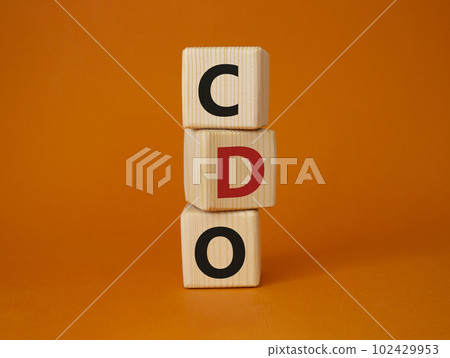 CDO - Collateralized Debt Obligation symbol. Wooden cubes with word CDO. Beautiful orange background. Business and Collateralized Debt Obligation concept. Copy space. CDO - Collateralized Debt Obligation symbol. Wooden cubes with word CDO. Beautiful orange background. Business and Collateralized Debt Obligation concept. Copy space. 102429953