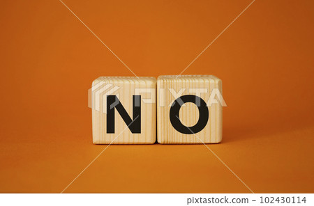 No symbol. Concept words No on wooden blocks. Beautiful orange background. Business and No concept. Copy space. No symbol. Concept words No on wooden blocks. Beautiful orange background. Business and No concept. Copy space. 102430114