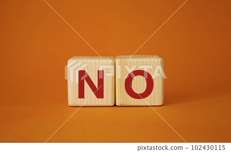No symbol. Concept words No on wooden blocks. Beautiful orange background. Business and No concept. Copy space. No symbol. Concept words No on wooden blocks. Beautiful orange background. Business and No concept. Copy space. 102430115