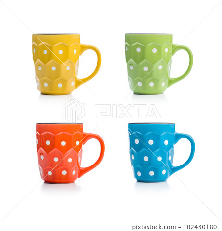 The polka dot mugs isolated on white background. The polka dot mugs isolated on white background. 102430180