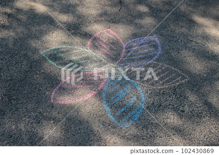 Children's drawing on the pavement. Multicolored chalk  102430869