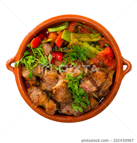 Chopped pieces of meat mixed with vegetables 102430967