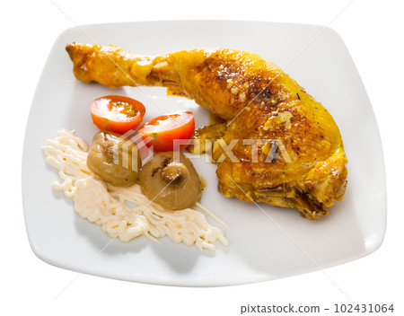 Fried chicken legs with baked onions and sauce Fried chicken legs with baked onions and sauce 102431064