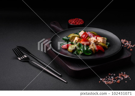 Delicious fresh salad of zucchini, cheese, sweet peppers, spinach with spices and herbs Delicious fresh salad of zucchini, cheese, sweet peppers, spinach with spices and herbs 102431071