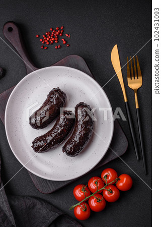 Delicious black blood sausage or black pudding with spices and herbs 102431093