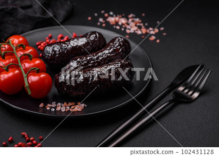 Delicious black blood sausage or black pudding with spices and herbs Delicious black blood sausage or black pudding with spices and herbs 102431128