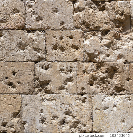 Bullets marks on the wall near the gates of Old City of Jerusalem, Israel. 102433645