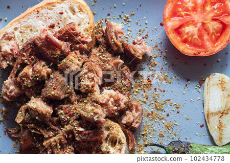 Turkish Street Food Stuffed Mussels with Lemon - Midye Dolma. High quality photo 102434778