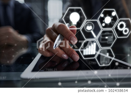 businessman pressing his finger on the screen of the digital tab businessman pressing his finger on the screen of the digital tab 102438634