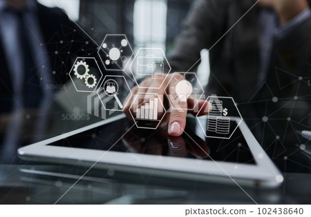 businessman pressing his finger on the screen of the digital tab businessman pressing his finger on the screen of the digital tab 102438640