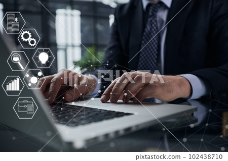 Man hands typing on laptop computer keyboard and surfing the internet on office table Man hands typing on laptop computer keyboard and surfing the internet on office table 102438710