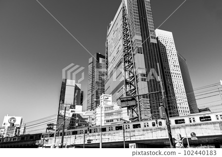 Ever-changing Tokyo Higashi Shimbashi 1-chome intersection Skyscrapers and railway 2023.04 b-6 Monochrome 102440183
